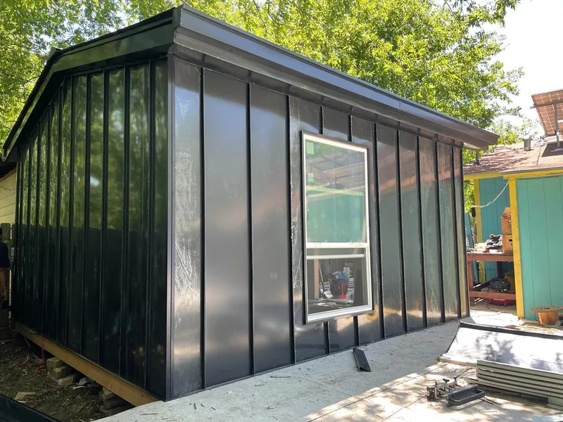 Black standing seam metal wall panels for Roof Inspection in Chesapeake Ranch Estates