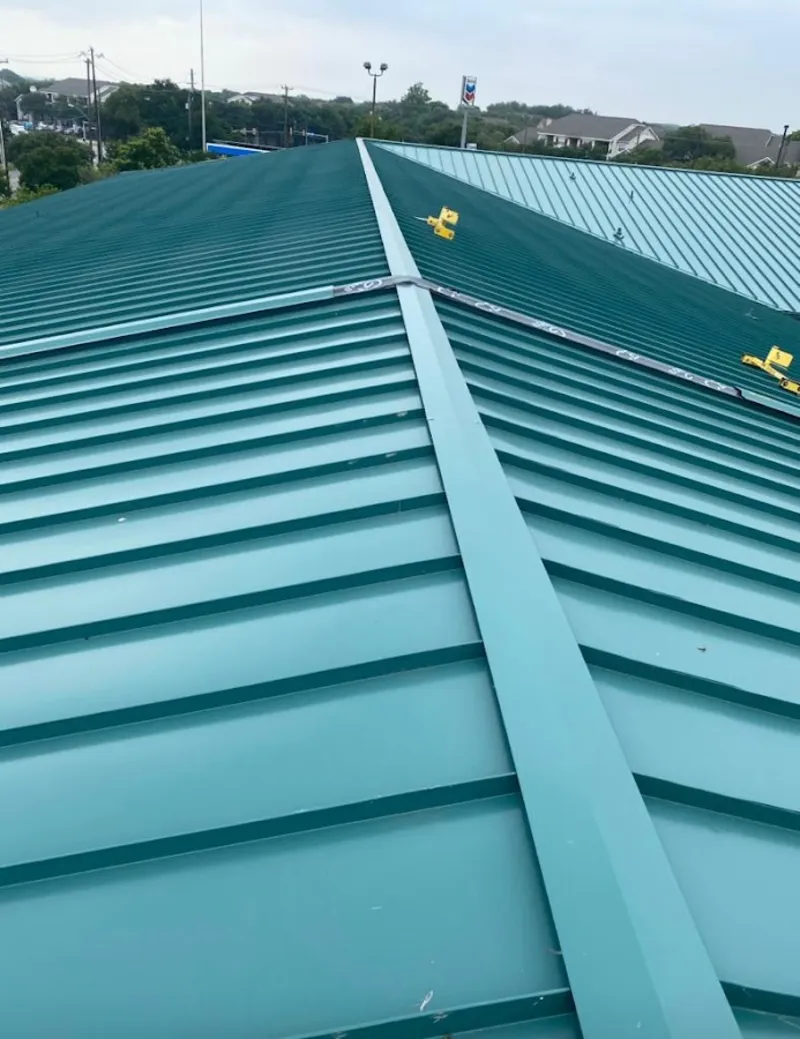Green commercial metal roof ridge and valley for Metal Roof Repair in Chesapeake Ranch Estates
