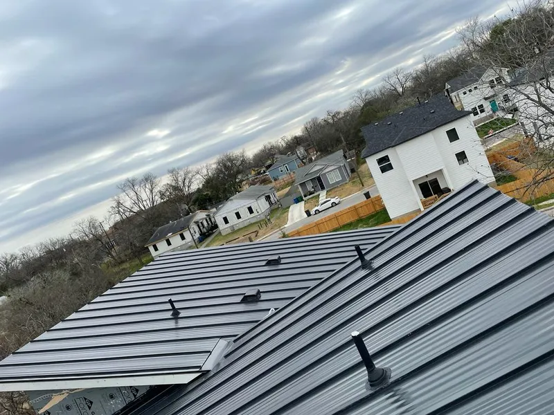 Standing seam metal roof panels with vents for Skylight Repair in Chesapeake Ranch Estates